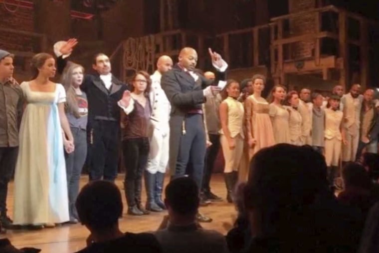 In this image made from a video provided by Hamilton LLC, actor Brandon Victor Dixon who plays Aaron Burr, the nation’s third vice president, in "Hamilton" speaks from the stage after the curtain call in New York, Friday, Nov. 18, 2016. Vice President-elect Mike Pence is the latest celebrity to attend the Broadway hit "Hamilton," but the first to get a sharp message from a cast member from the stage. (Hamilton LLC via AP)