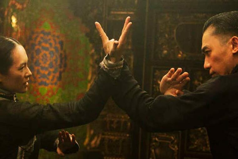 Ziyi Zhang (left), as Gong Er , and Tony Leung, as Ip Man, face off in more ways than one in "The Grandmaster." In real life, Ip Man was credited with training kung fu legend Bruce Lee.
