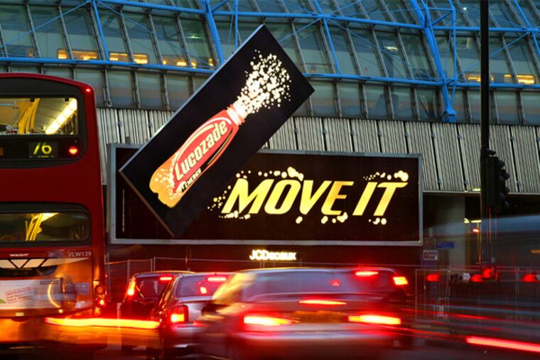 Drugmaker GlaxoSmithKline P.L.C. said Monday it had agreed to sell two soft drink brands to the Japanese company Suntory Beverage & Food Ltd. for $2.1 billion so it can focus on its pharmaceutical products.