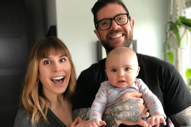 Becky and Andrew Johnson-Lally with daughter Emma.