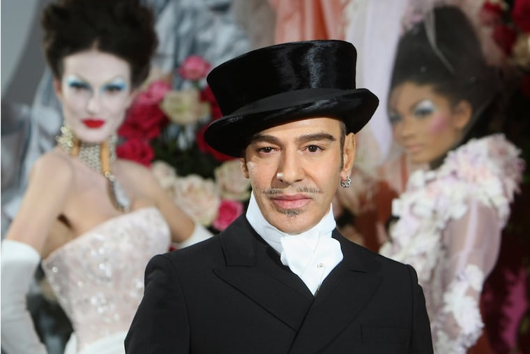Fashion designer John Galliano poses at the end of the presentation of the Dior Haute Couture spring/summer 2010 fashion collection in January 2010.