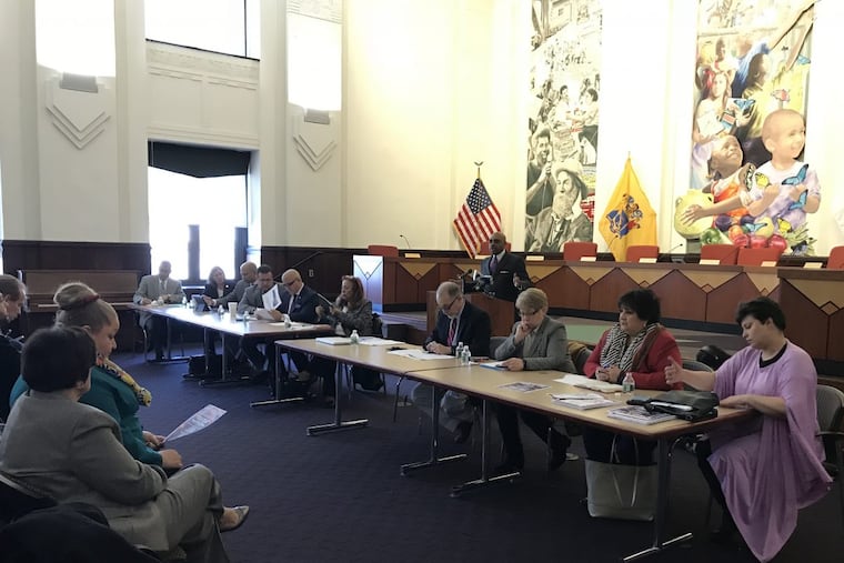 Pastor Joshua Rodriguez, chair of the New Jersey Commission on Puerto Rico Relief, addresses the crowd during a meeting in Camden City Hall.