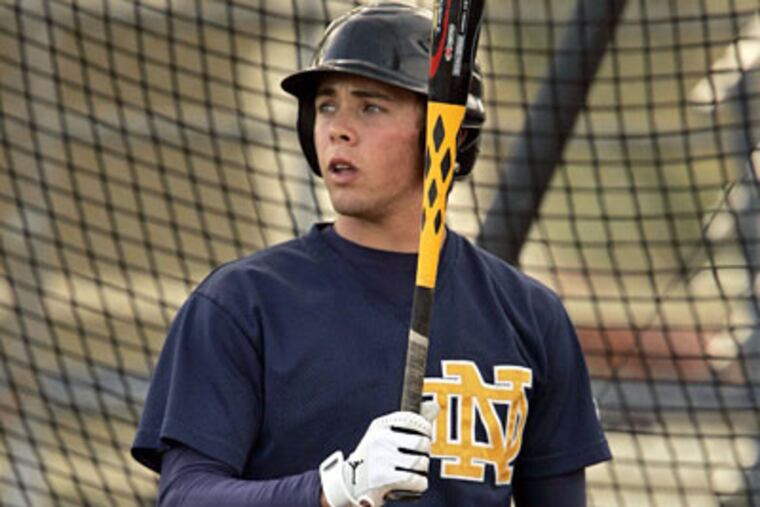 Notre Dame first baseman Kelly Dugan, one of the best switch hitters in the Southland, was the Philies' top draft pick. He signed his contract Saturday, receiving a $485,000 signing bonus and a college-tuition package, and will head to Clearwater, Fla., to begin his pro career later this week.