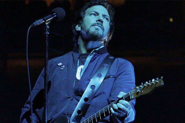 Eddie Vedder, in fine voice at the Wells Fargo Center Monday. "My only wish is to wish for nothing," he sang. "Who could ask for more?" (Steven M. Falk/Staff Photographer)