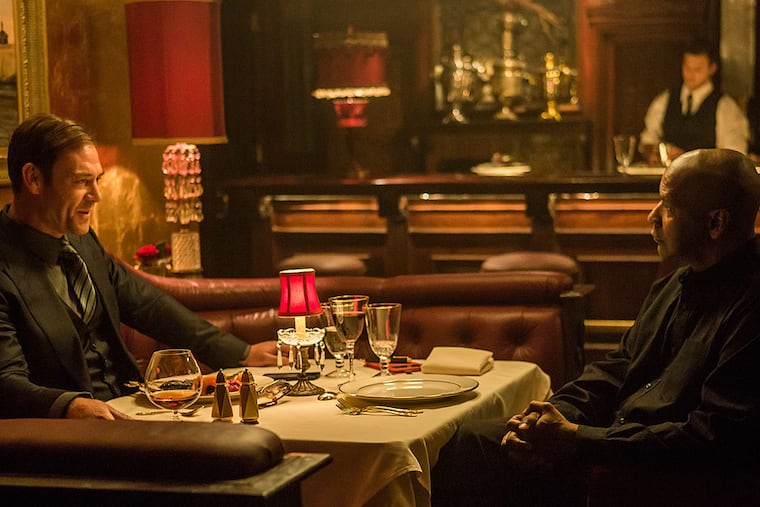 If I had a hammer: Marton Csokas (left) and Denzel Washington in "The Equalizer," a reboot of the 1980s TV series. (Columbia Pictures)