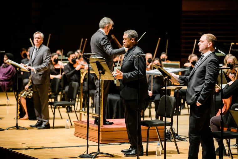 Bass-baritone Mark S. Doss (center) as Créon and the Messenger, with (left) William Burden as
Oedipus and Ethan Burck as the Shepherd in Opera Philadelphia's production of Oedipus Rex Friday in Verizon Hall. Corrado Rovaris conducts.