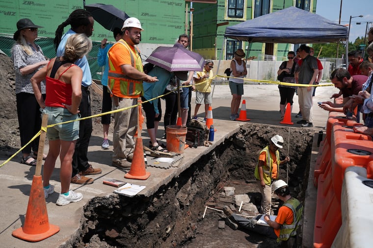 Senior archeologist Joel Dworsky, gives a tour of one of two exploratory trenches at site of the historic West Shipyard site on Columbus Boulevard.