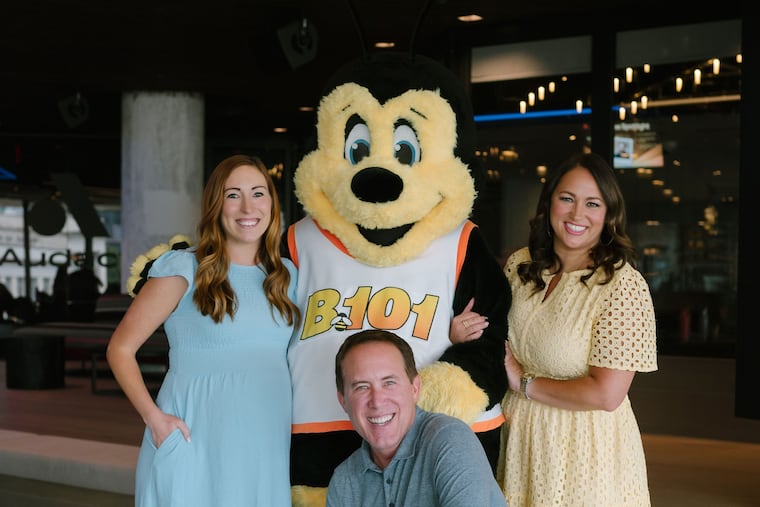 Kathy Romano (right) with new B101 cohosts Bobby Smith and Laura Boss.