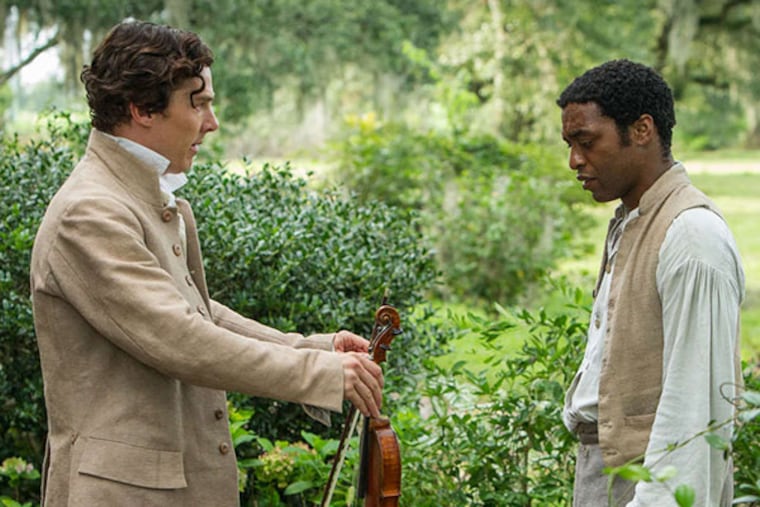 Benedict Cumberbatch, left, and Chiwetel Ejofor in a scene from "12 Years A Slave." (AP Photo/Fox Searchlight, Jaap Buitendijk)