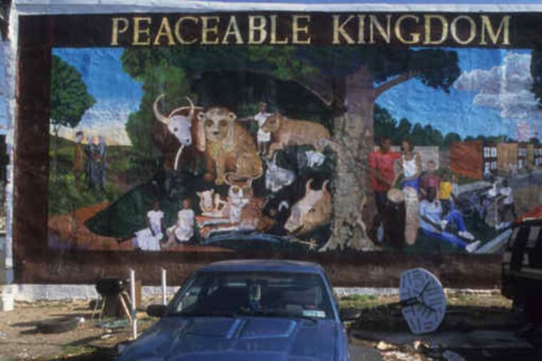 This North Philadelphia mural, finished by the Montgomery Township woodworker and sculptorin 2001, is based on "Peaceable Kingdom," by 19th-century American artist Edward Hicks.