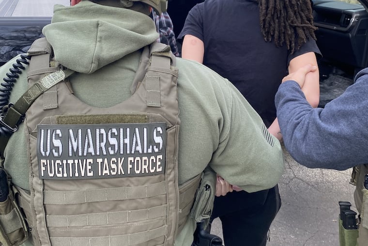 Tywin Jones was arrested early Wednesday by U.S. Marshals in Lansdowne. Investigators say Jones was involved in three killings, including the execution-style murder of a 16-year-old boy.