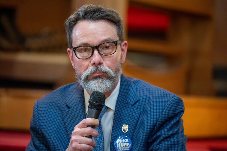 Mike Huff, a Democrat running for a spot in the Court of Common Pleas and Municipal Court, appears at a candidates forum on March 23, hosted by the National Coalition of 100 Black Women at Mount Carmel Baptist Church in West Philadelphia.