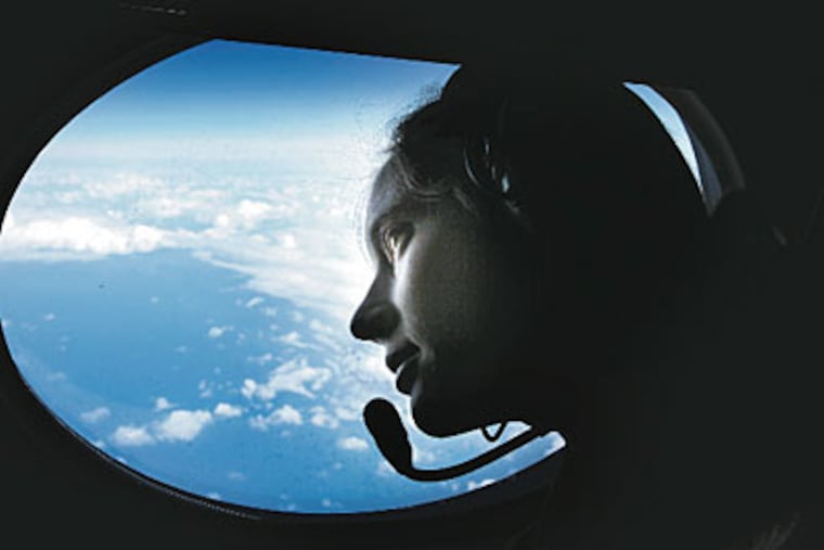 “This is a weather nerd’s dream job,” says meteorologist Jessica Williams, a Willow Grove native, over the North Pacific. (LAURENCE KESTERSON / Staff Photographer)