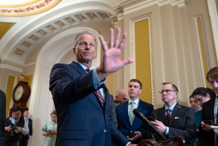 Senate Majority Leader John Thune (R., S.D.) speaks to reporters on Tuesday as Republicans work to pass an interim spending bill that would avoid a partial government shutdown and keep federal agencies funded through September.