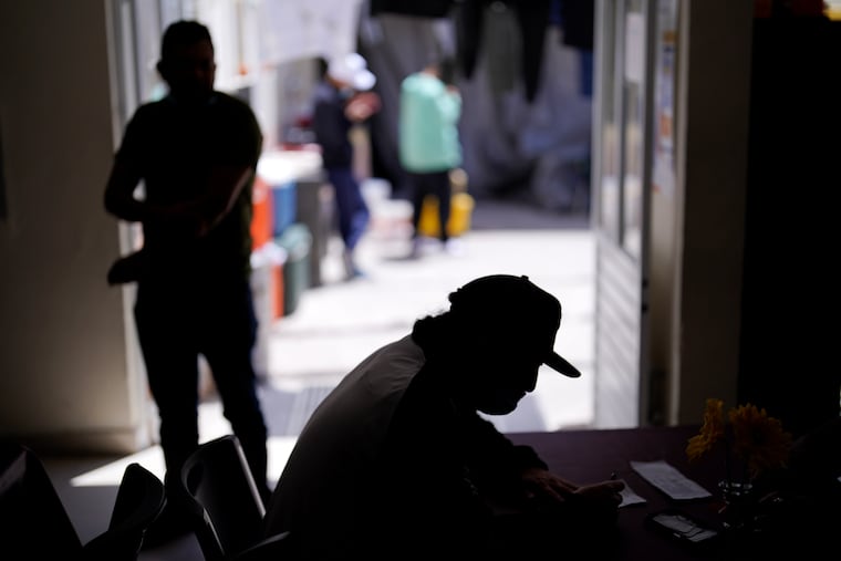A man from Nicaragua sits at a shelter for migrants, April 21, 2022, in Tijuana, Mexico. The Supreme Court has ruled that the Biden administration properly ended a Trump-era policy forcing some U.S. asylum-seekers to wait in Mexico. The justices’ 5-4 decision for the administration came in a case about the “Remain in Mexico” policy under President Donald Trump.
