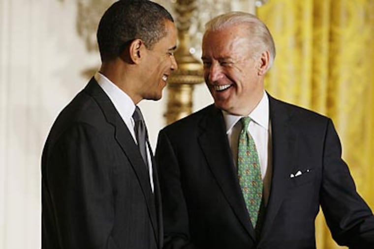 Vice President Joe Biden (right) will be in Philadelphia today to promote the government's new green jobs initiative. (Charles Dharapak/AP)