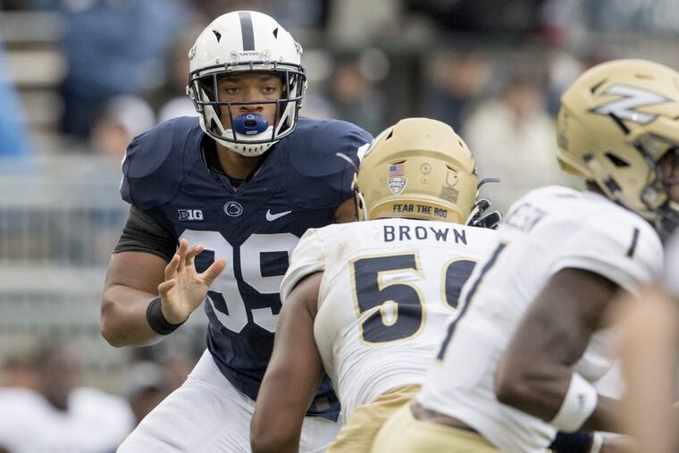 Penn State defensive end Yetur Gross-Matos takes on Akron’s Trevor Brown during the 52-0 rout.
