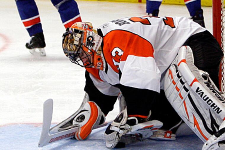 Flyers goalie Brian Boucher reacts to his team's 4-3 loss to the Rangers. (AP Photo/Frank Franklin II)