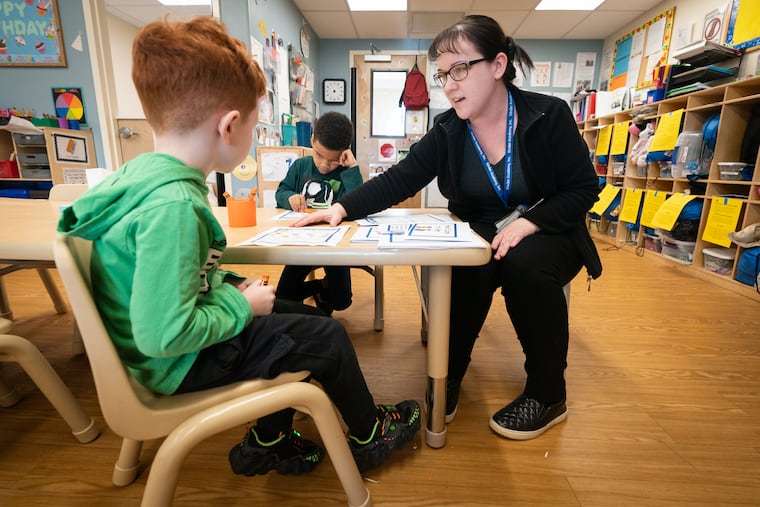 Lead Teacher Megan Shirley (right) works with her students at the Kinder Academy in Philadelphia on April 4, 2024. This week, childcare providers and business leaders across the Pennsylvania held a news conference asking state lawmakers to pass the budget with $55 million to support the industry's staffing shortage.
