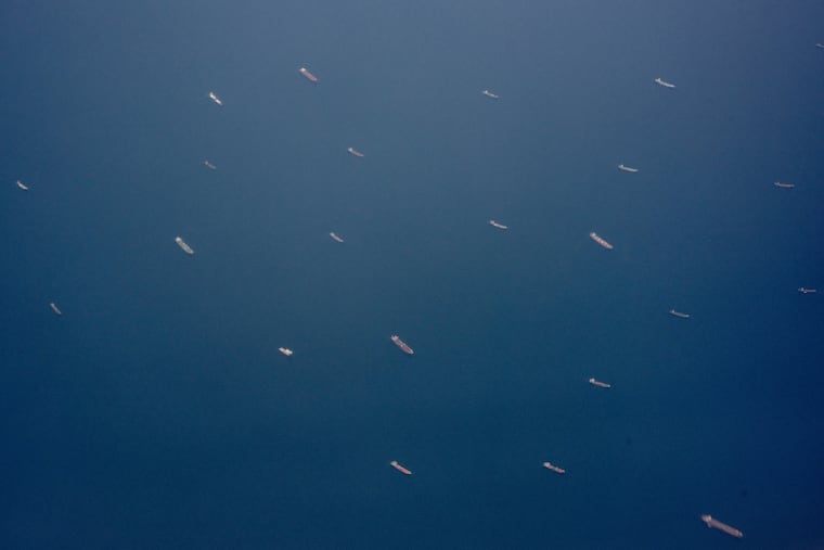 FILE — Ships near the Strait of Hormuz, as seen from a plane near the United Arab Emirates, July 20, 2026. Iran has survived decades of sanctions. Faced with more, it is likely to escalate rather than surrender, analysts said. (Tomas Munita/The New York Times)