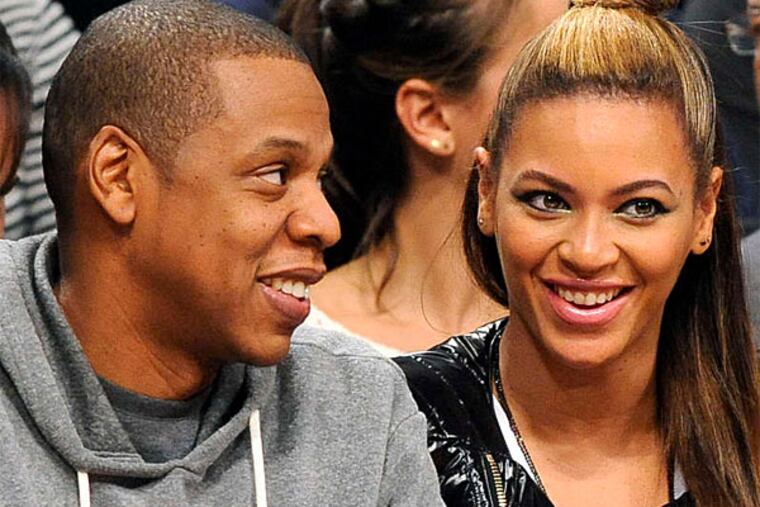 The Carters launch their coheadlining "On the Run" tour June 25 in Miami, hit Philly July 5. (Kathy Kmonicek/Associated Press)