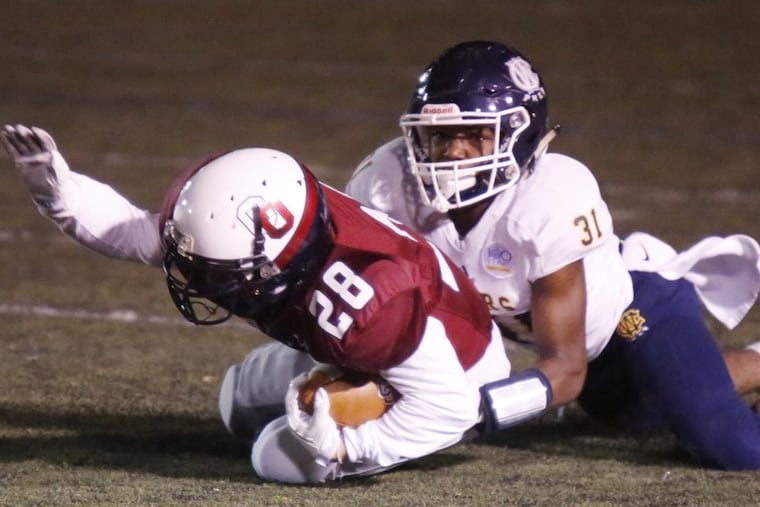 West Catholic’s Jacir Savoy (31), here making a tackle against Cardinal O’Hara last season, plays only on offense this year.