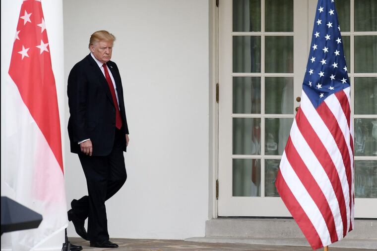 President Trump arrives for an event in the Rose Garden.