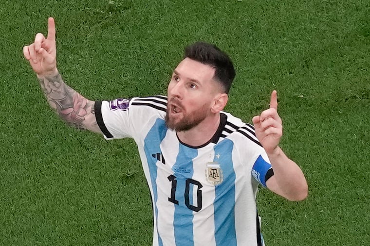 Argentina's Lionel Messi celebrates scoring his side's first goal during the World Cup final between Argentina and France at the Lusail Stadium in Lusail, Qatar.
