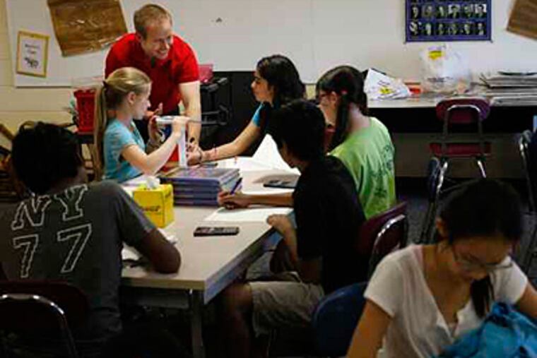 Scott Goldthorp answers questions in his sixth-grade math class at Rosa International Middle in Cherry Hill in this May 2010 file photo. ( Michael S. Wirtz / Staff Photographer ). 5/7/2010.