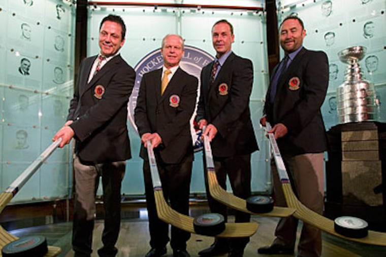 "The orange and black will be a part of me forever," Mark Howe (second from left) said. (Frank Gunn/Canadian Press/AP)