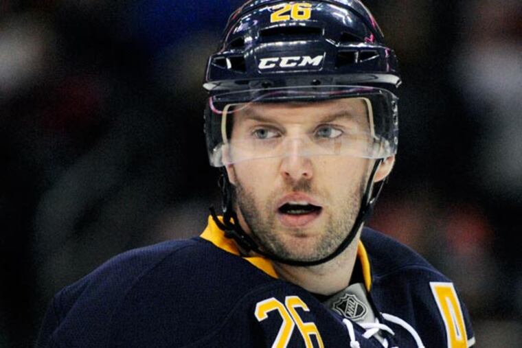Buffalo Sabres' Thomas Vanek pauses before a face-off against the Philadelphia Flyers' during the first period of an NHL hockey game in Buffalo, N.Y., Saturday, April 13, 2013. (Gary Wiepert/AP)