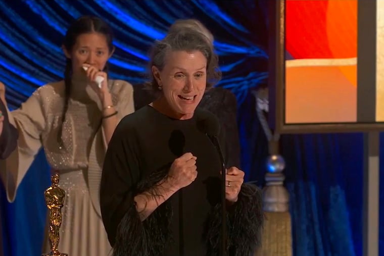 In this video image provided by ABC, Frances McDormand accepts the best picture award for "Nomadland" as director Chloé Zhao looks on at the Oscars on Sunday.
