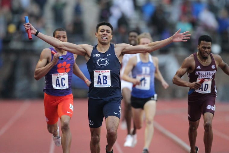Isaiah Harris of Penn State reacts he crosses the finish line in the College Men's Sprint Medley Championship of America on April 27, 2018. The Penn State men rallied from behind to win. CHARLES FOX / Staff Photographer
