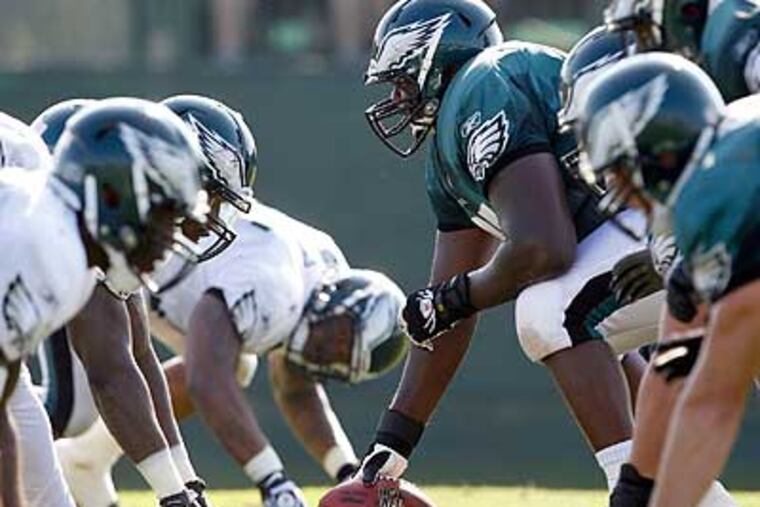 Despite a potential backup role, Jamaal Jackson (center) is one of the Eagles' leaders. (Yong Kim/Staff Photographer)