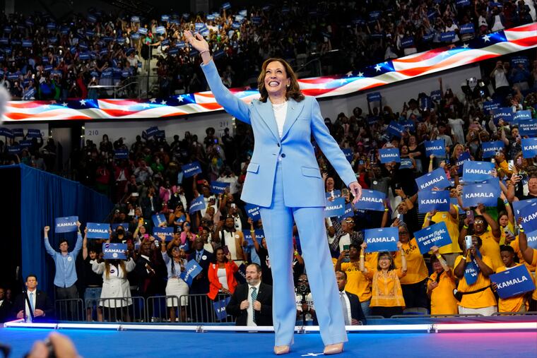 Vice President Kamala Harris waves during a campaign rally on July 30 in Atlanta. (AP Photo/John Bazemore, File)