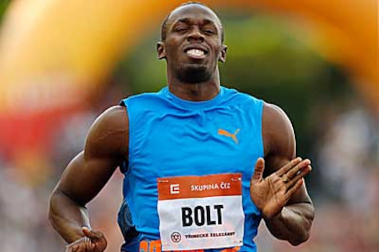 Usain Bolt is just one athlete to watch at the Olympics. (Petr David Josek/AP)