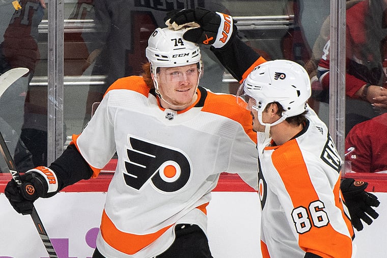 Owen Tippett celebrates with Joel Farabee (86) after scoring against the Montreal Canadiens during the first period on Saturday. Tippett had two goals in the loss.