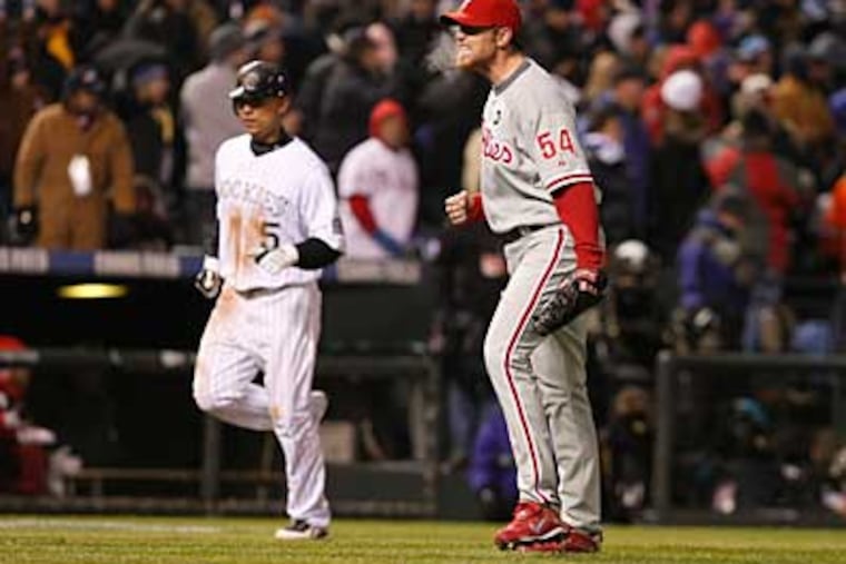 Closer Brad Lidge celebrates after picking up the save and securing the Game 3 victory for the Phillies, 6-5. (Ron Cortes / Staff Photographer)