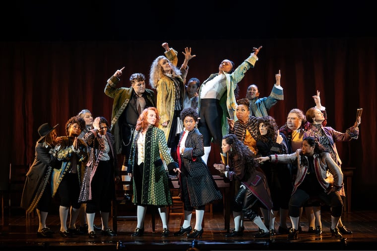 Sav Souza as Dr. Josiah Bartlett (center-left, pointing a finger) and Brooke Simpson as Roger Sherman (on the right of John Adams in the front) in Roundabout Theatre Company's '1776.'