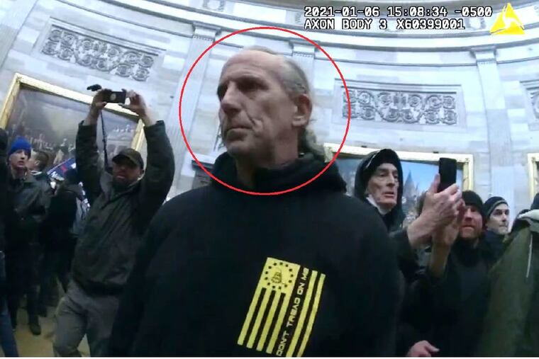 Surveillance footage from the U.S. Capitol building showing James Robinson, of Schwenksville, among the crowd that mobbed the Rotunda during the Jan. 6, 2021 attack on the building.