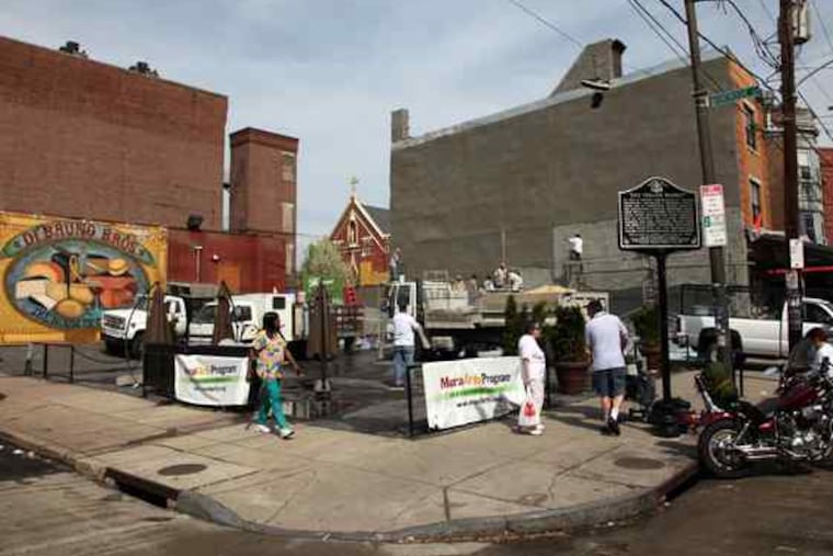 The landmark mural of Frank L. Rizzo in the Italian Market is being repainted by the artist who first did it in 1995. "He's coming back more beautiful," a neighbor said. Story, B5.