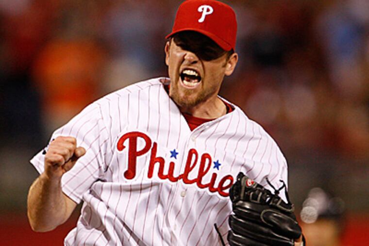 Brad Lidge reacts after striking out Adam Dunn to end the game. (Ron Cortes/Staff Photographer)