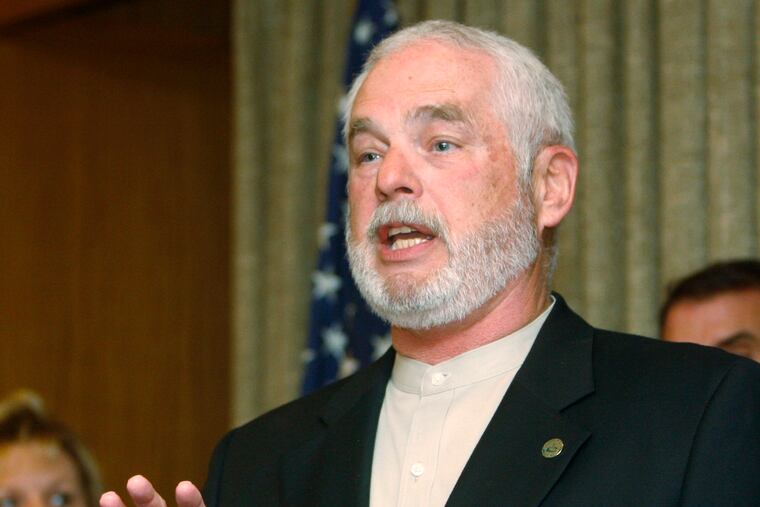 FILE - In this Nov. 29, 2010, file photo, Charles Lamb answers a question at a news conference in Oklahoma City. Lamb, the late mayor of Edmund, Okla., who died in December, has advanced to the general election following a Facebook campaign supporting him. Lamb's name will be on the April 2 general election ballot with former Mayor Dan O'Neil, after Lamb finished second to O'Neil in the three-person race Tuesday. If the late Lamb is elected, the City Council would appoint a mayor.