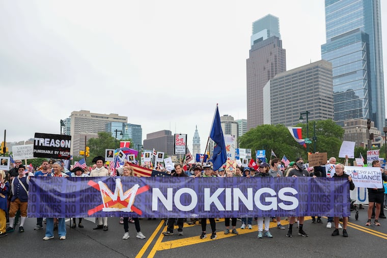 Attendees at a pro-democracy “No Kings” protest on the Parkway in June.