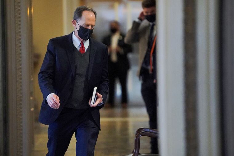 Sen. Pat Toomey (R., Pa.) arrives at the start of the fifth day of the second impeachment trial of former President Trump, Saturday, Feb. 13, 2021 at the Capitol in Washington.