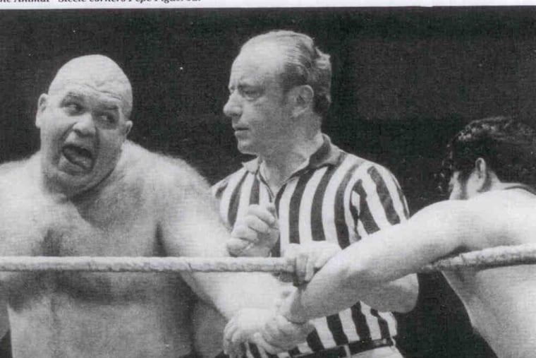 Robert P. "Dusty" Feldbaumer Sr. in the ring as a referee for the World Wrestling Federation.