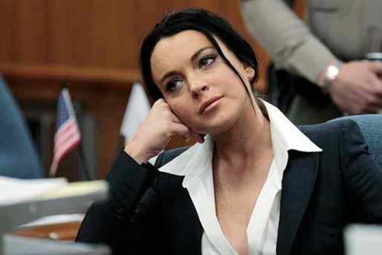 Lindsay Lohan in court. She's being monitored now for boozing.