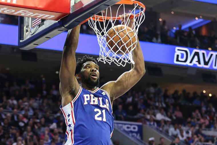 Sixers' Joel Embiid dunks against the Nets during the 3rd quarter of Game 5 of the first round of the NBA playoffs at the Wells Fargo Center in Philadelphia, Tuesday, April 23, 2019. Sixers beat the Nets 122-100 to win the first round of the playoffs (4-1).
