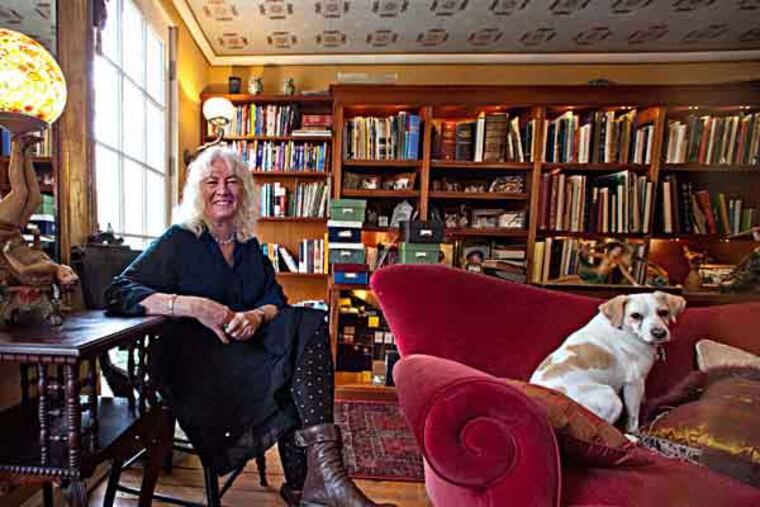 Judy Wicks and her dog Jack in the upper level of her home, February 25, 2013. ( DAVID M WARREN / Staff Photographer )