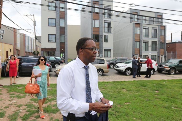 In Francisville, across the street from condos that sold for $270,000 last year, a cadre of state and city officials will tout City Council's plan to build 2,000 units of affordable housing. Darrell Clarke wants to leverage vacant city-owned land in rapidly developing nabes to support middle-class families Monday June 15, 2015. ( DAVID SWANSON / Staff Photographer )